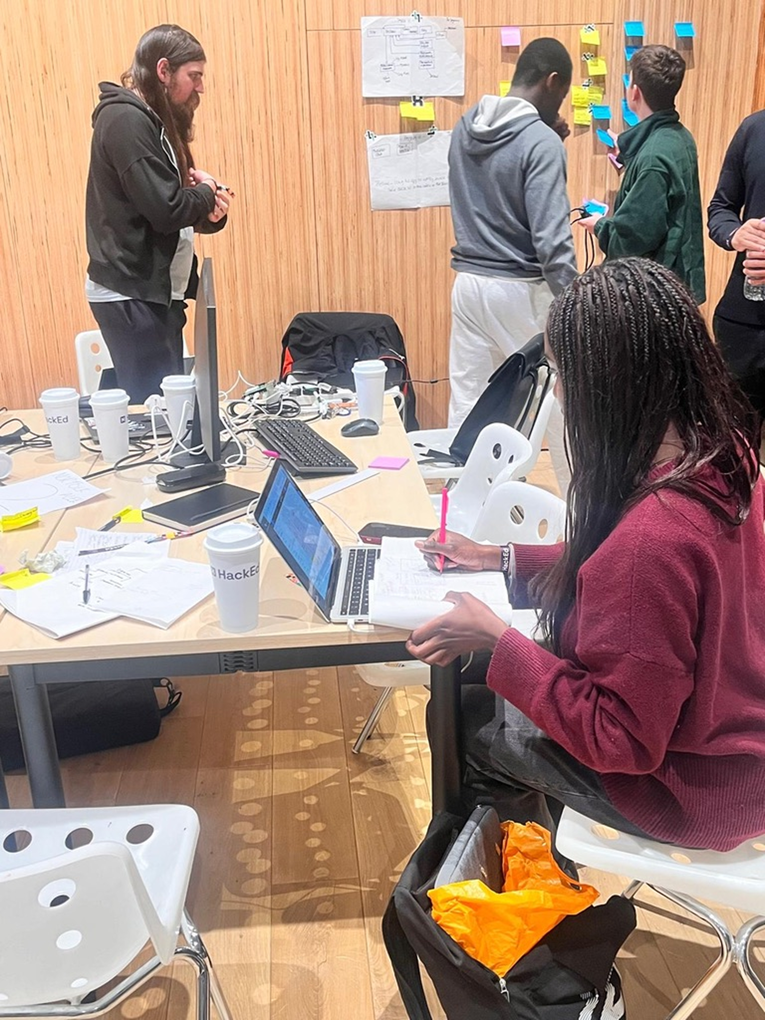 Sharde working at a hackathon